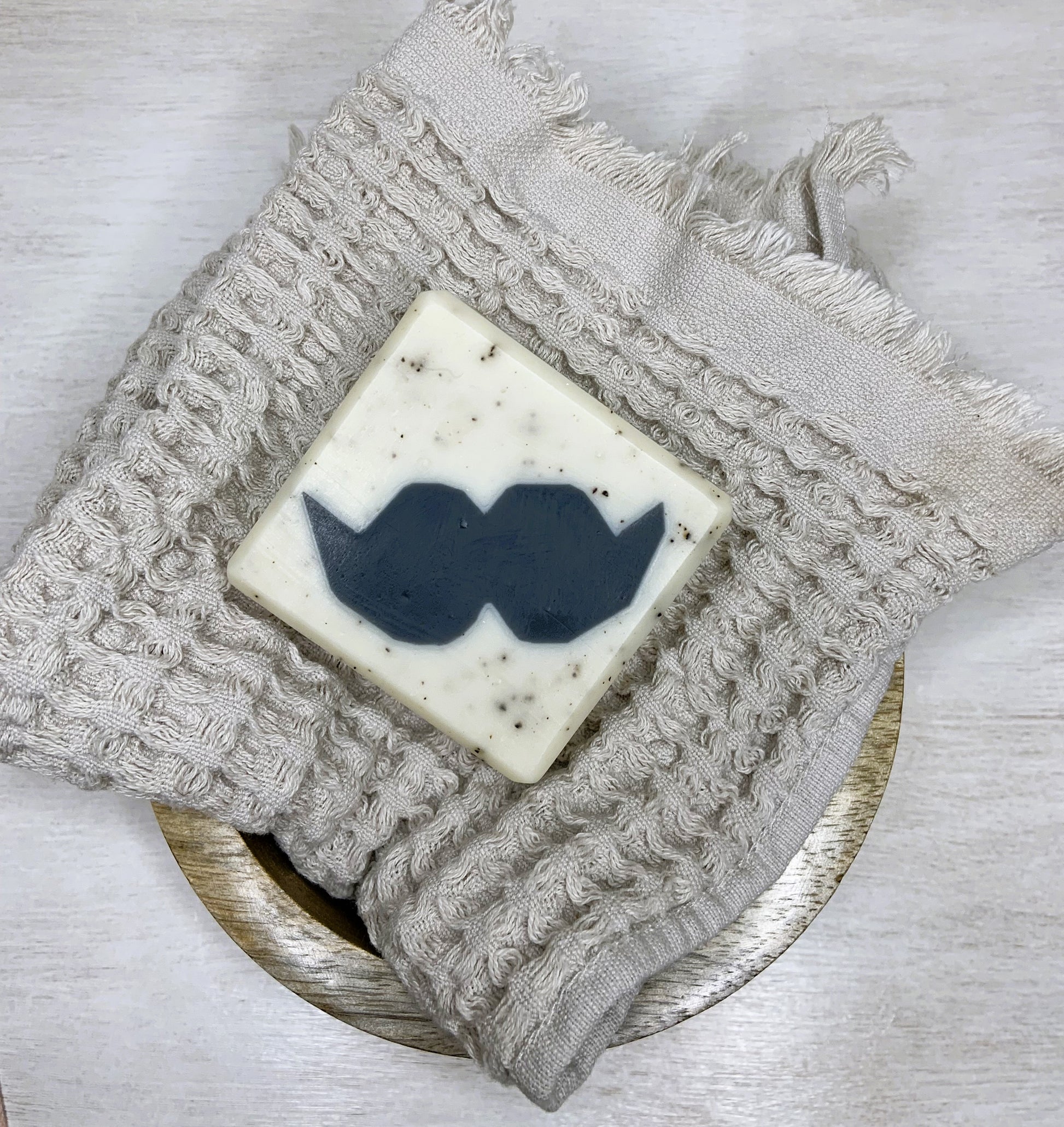 Infused with the moisturizing mango butter, our natural soap leaves your skin feeling soft and refreshed. Coffee grounds provide gentle exfoliation. Stylish, fun, and full of personality, this soap is perfect for upgrading your bathroom vibes, putting a smile on your face, and impressing your guests